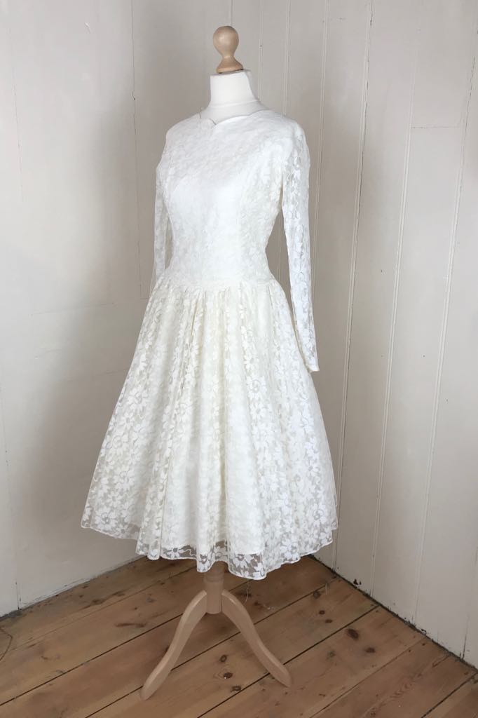 Long sleeved 50's dress with circle skirt and bow back detail. Size uk Days of Grace Vintage Long sleeved 50's dress with circle skirt and bow back detail. Size uk Days of Grace Vintage